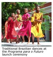 Photo of three young women performing a traditional Brazilian dance at the Programa para o Futuro launch ceremony