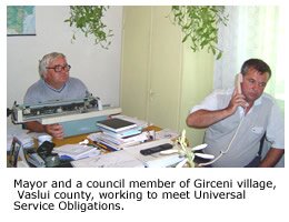 Mayor and a council member of Girceni Village, Vaslui County, working to meet Universal Service Obligations.