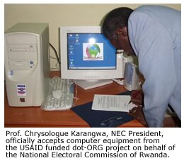 Prof. Chrysologue Karangwa, NEC President, officially accepts computer equipment from the USAID funded dot-ORG project on behalf of the National Electoral Commission of Rwanda.