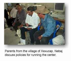 Parents from the village of Xexucap, Nebaj discuss policies for running the center.