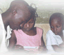 image of three children from Guinea reading